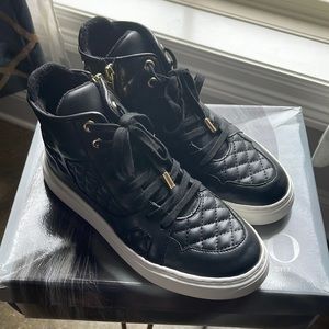 J Lo high-top sneakers in the color Black.